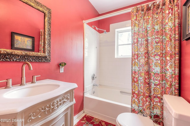 bathroom with shower / bath combo, vanity, and toilet