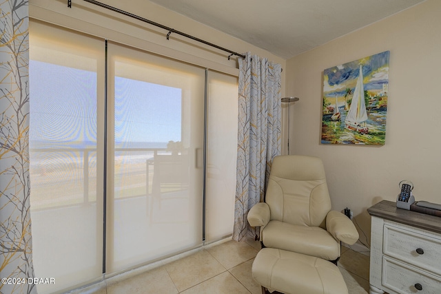 sitting room with light tile patterned floors