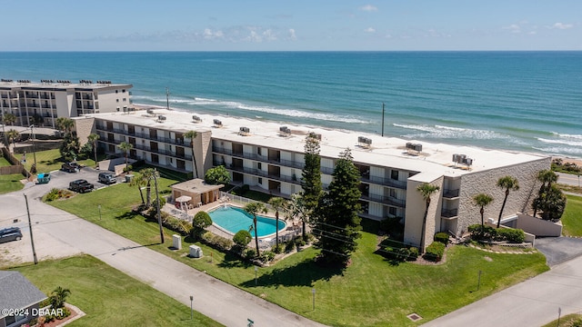 aerial view featuring a water view and a beach view