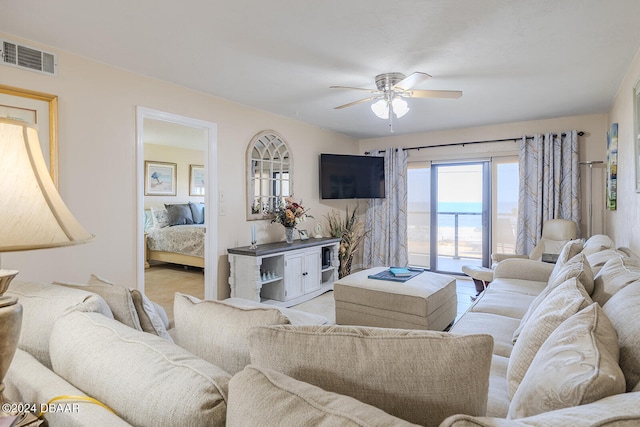 living room with ceiling fan