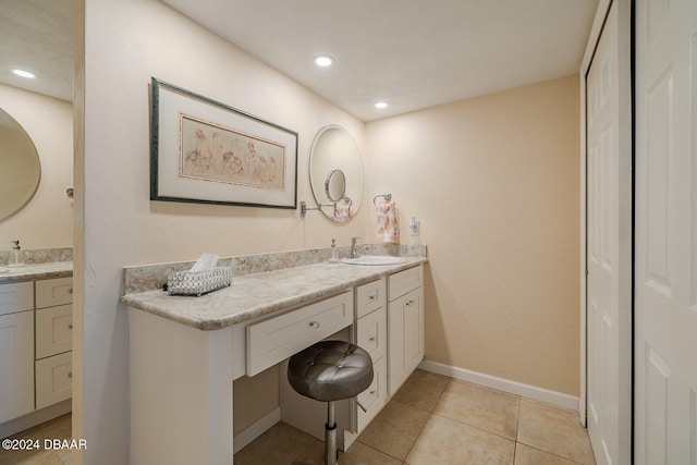 bathroom with vanity and tile patterned floors