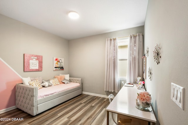 bedroom featuring hardwood / wood-style flooring