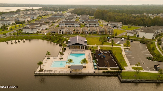 birds eye view of property featuring a water view