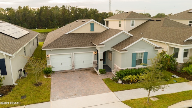 view of front of house with a garage