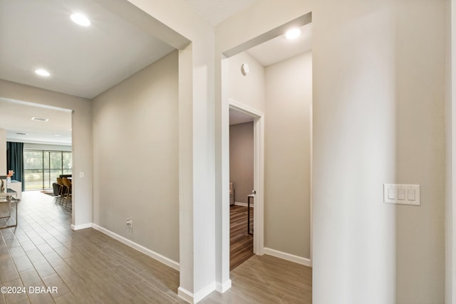 corridor featuring hardwood / wood-style flooring