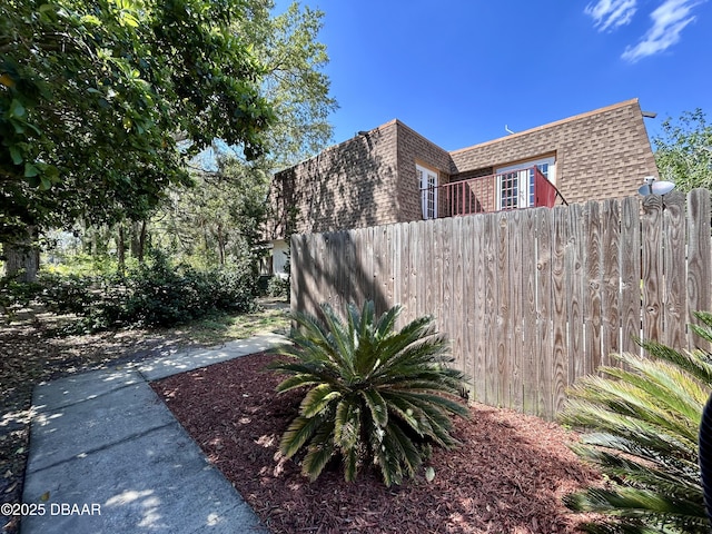 view of yard featuring fence