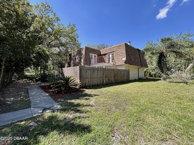 view of yard with fence