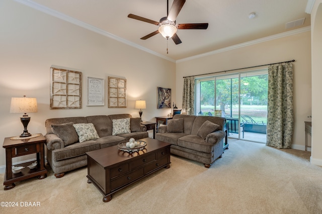 carpeted living room with ceiling fan and ornamental molding