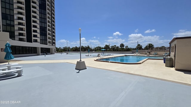 pool featuring a patio area