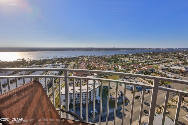 balcony featuring a water view