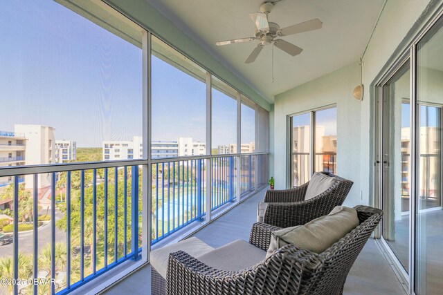5300 S Atlantic Ave Unit 1-603, New Smyrna Beach, FL 32169 - sunroom / solarium featuring a ceiling fan