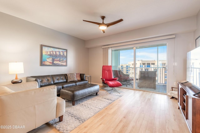 5300 S Atlantic Ave Unit 1-603, New Smyrna Beach, FL 32169 - living room featuring ceiling fan and wood finished floors