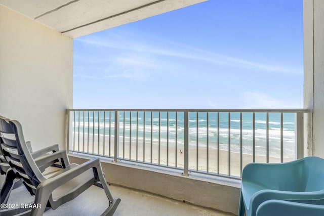4453 S Atlantic Ave Unit 502, Port Orange, FL 32127 - balcony featuring a water view and a view of the beach