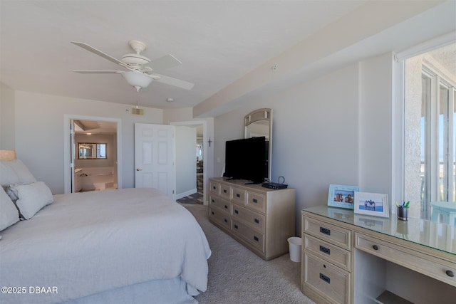 carpeted bedroom featuring connected bathroom and ceiling fan