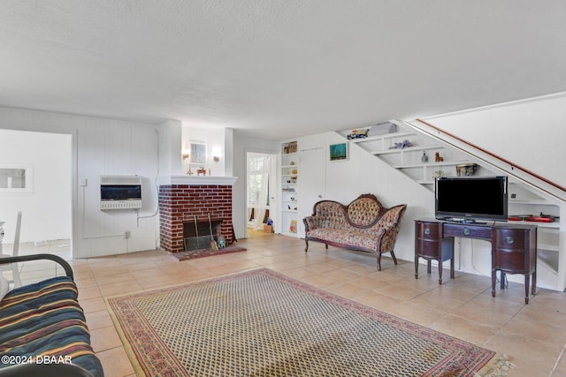 living room with a brick fireplace, light tile patterned floors, a textured ceiling, and heating unit