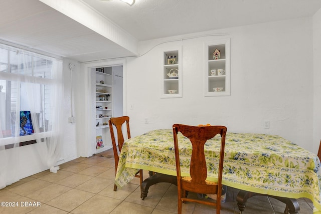 dining room with tile patterned floors