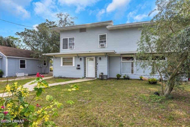 view of front facade with a front lawn