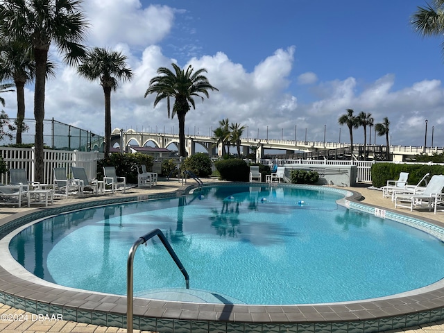 view of swimming pool featuring a patio