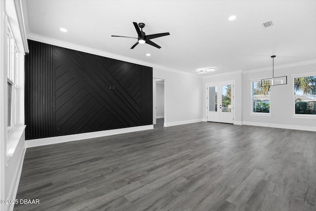 142 Sandpiper Ridge Dr, Ormond Beach, FL 32176 - unfurnished living room with crown molding, baseboards, ceiling fan, dark wood-style flooring, and recessed lighting
