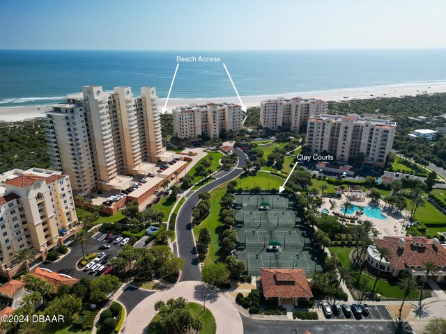 bird's eye view with a beach view and a water view