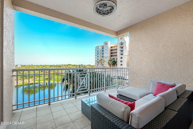 balcony featuring a water view