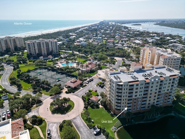 aerial view featuring a water view and a beach view