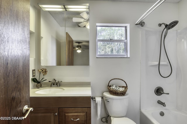 full bathroom with vanity, ceiling fan, toilet, and shower / washtub combination