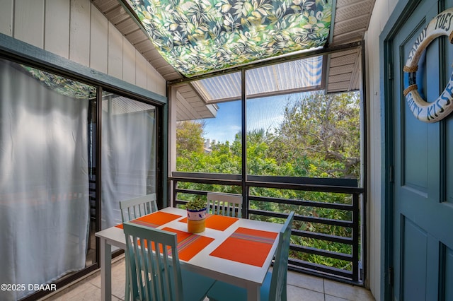 4405 Sea Mist Dr Unit 218, New Smyrna Beach, FL 32169 - sunroom with outdoor dining space and healthy amount of natural light