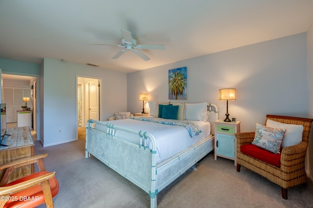 4405 Sea Mist Dr Unit 218, New Smyrna Beach, FL 32169 - carpeted bedroom featuring ceiling fan and baseboards