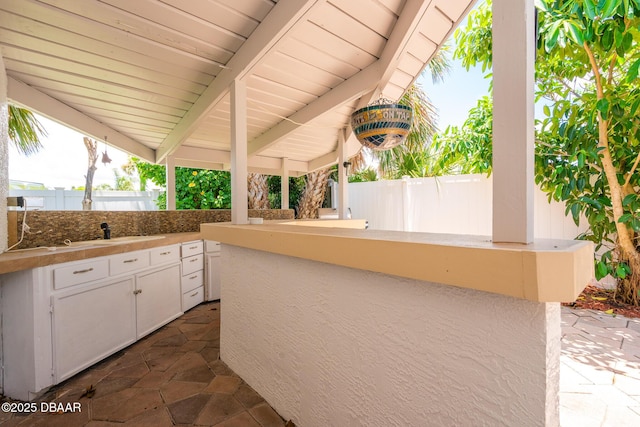 46 Oceanview Ave, Ponce Inlet, FL 32127 - view of patio / terrace featuring an outdoor kitchen and a sink