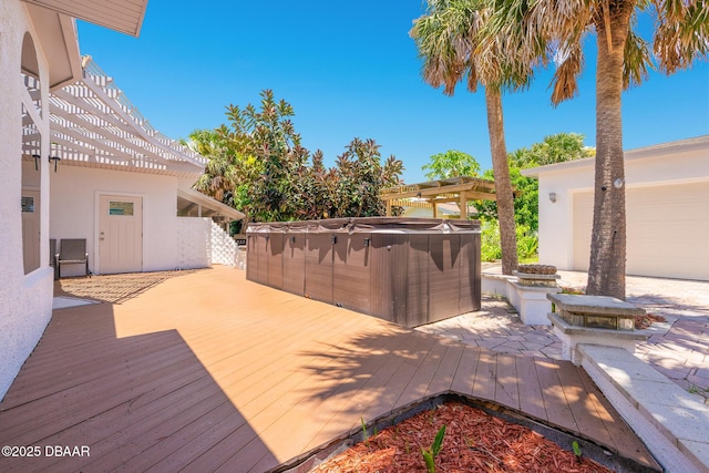46 Oceanview Ave, Ponce Inlet, FL 32127 - deck with a hot tub and a pergola
