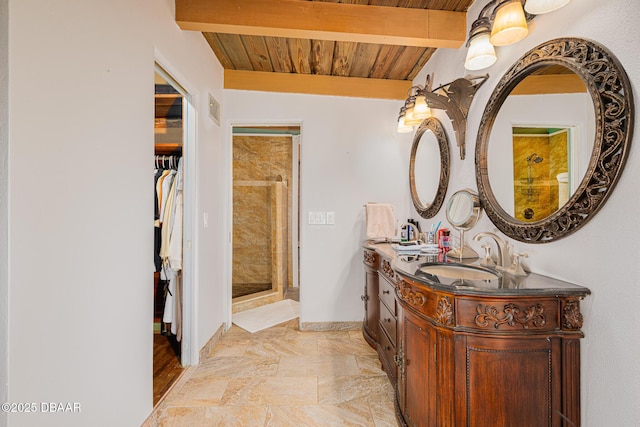 46 Oceanview Ave, Ponce Inlet, FL 32127 - full bath with double vanity, a stall shower, a wooden ceiling with exposed beams, and a spacious closet