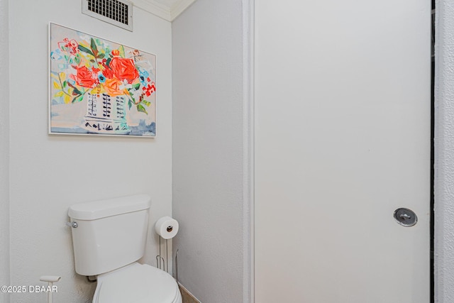 46 Oceanview Ave, Ponce Inlet, FL 32127 - bathroom featuring crown molding and toilet