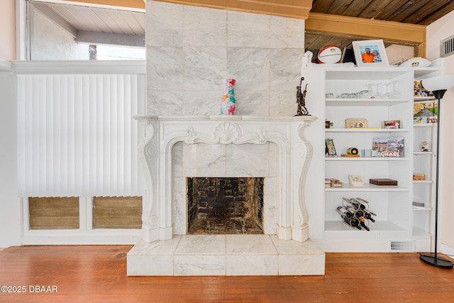 46 Oceanview Ave, Ponce Inlet, FL 32127 - detailed view of wood finished floors and a high end fireplace