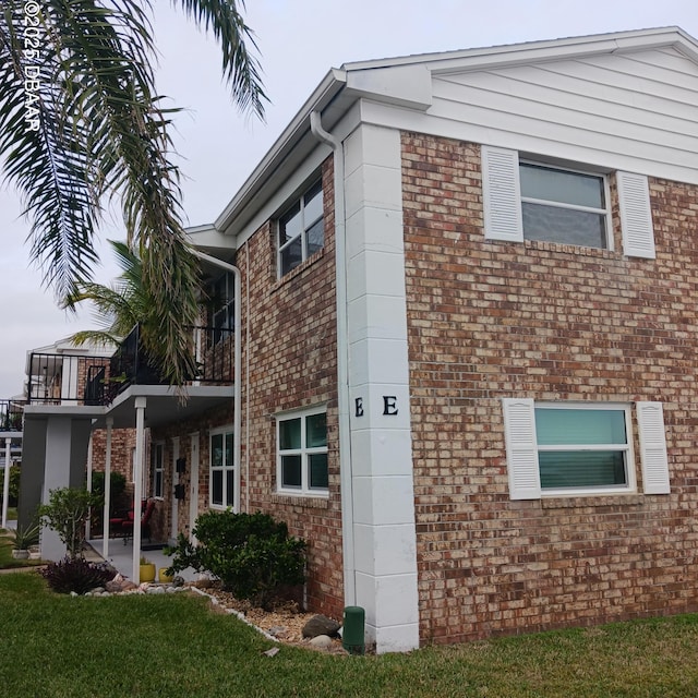 view of property exterior with a balcony