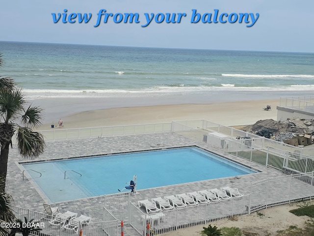 2043 S Atlantic Ave Unit 415, Daytona Beach, FL 32118 - community pool with view of water and beach