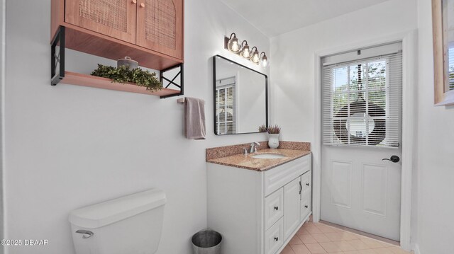 156 Holly Hill Ct, New Smyrna Beach, FL 32168 - bathroom featuring vanity and tile patterned flooring