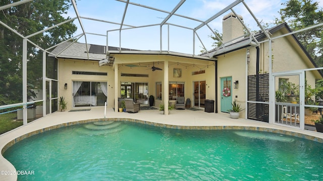 156 Holly Hill Ct, New Smyrna Beach, FL 32168 - back of house with stucco siding, a patio, and ceiling fan