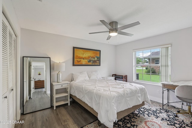 113 Bridgehaven Dr, Palm Coast, FL 32137 - bedroom featuring dark wood-style floors, a ceiling fan, and a closet