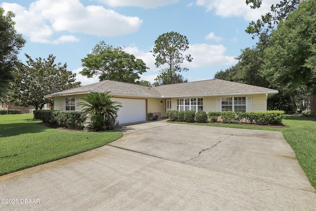 113 Bridgehaven Dr, Palm Coast, FL 32137 - single story home with a front lawn, concrete driveway, and a garage