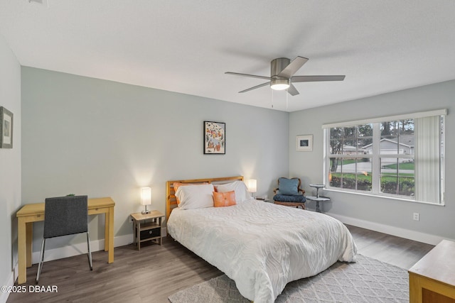 113 Bridgehaven Dr, Palm Coast, FL 32137 - bedroom with wood finished floors and a ceiling fan
