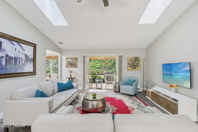 113 Bridgehaven Dr, Palm Coast, FL 32137 - living area featuring a skylight, vaulted ceiling, wood finished floors, and ceiling fan