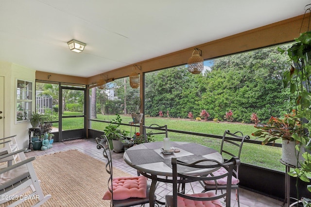 113 Bridgehaven Dr, Palm Coast, FL 32137 - sunroom / solarium featuring outdoor dining area