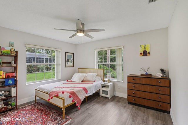 113 Bridgehaven Dr, Palm Coast, FL 32137 - bedroom featuring wood finished floors and ceiling fan