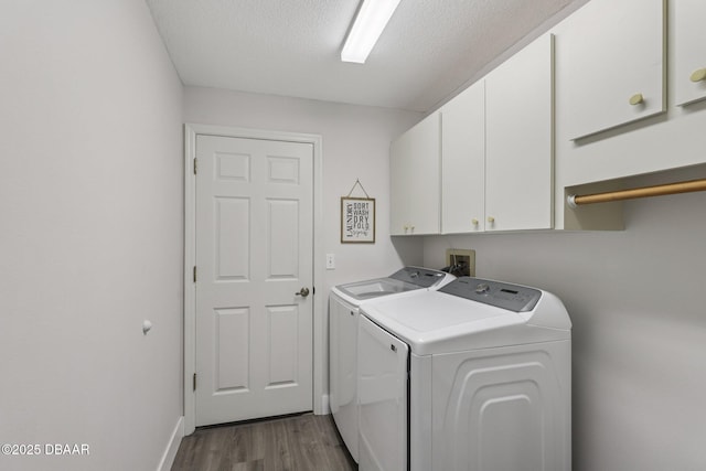 113 Bridgehaven Dr, Palm Coast, FL 32137 - washroom featuring cabinet space, independent washer and dryer, wood finished floors, and a textured ceiling