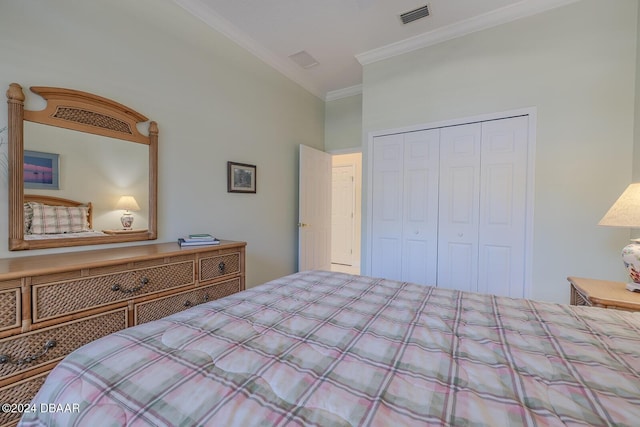 bedroom featuring a closet and ornamental molding