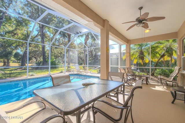 exterior space featuring ceiling fan and a lanai