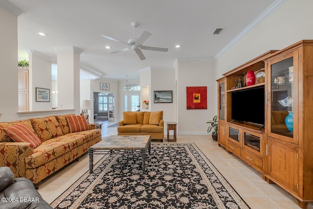 living room featuring ceiling fan, french doors, light tile patterned floors, and ornamental molding