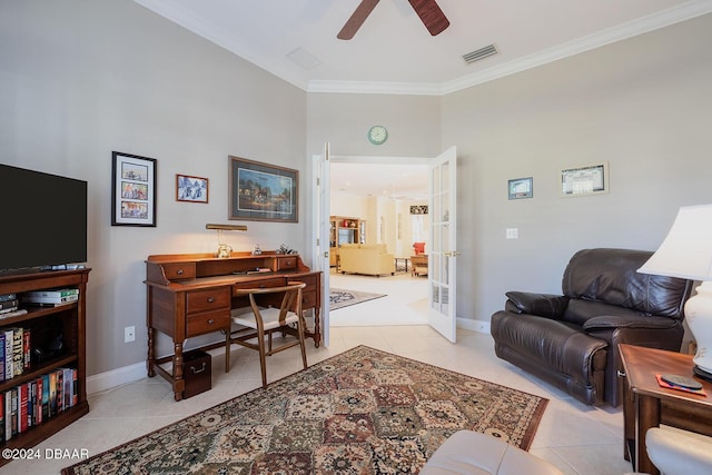 tiled living room with ceiling fan, french doors, and ornamental molding