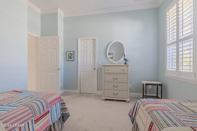 carpeted bedroom featuring crown molding